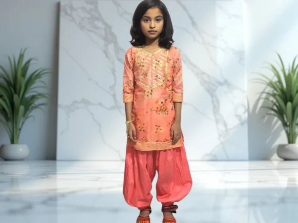 "Vibrant Deep Peach Churidar Attire for Girls"